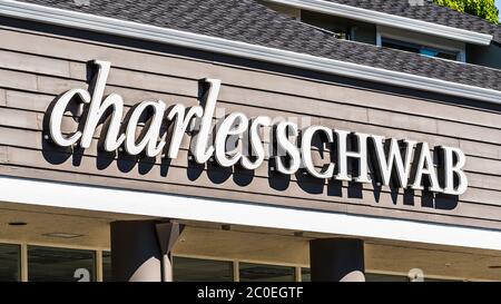 June 10, 2020 Sunnyvale / CA / USA - Close up of Charles Schwab sign displayed at a branch in South San Francisco Bay Area; The Charles Schwab Corpora Stock Photo
