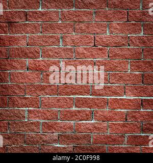 Wall from red brick close up Stock Photo