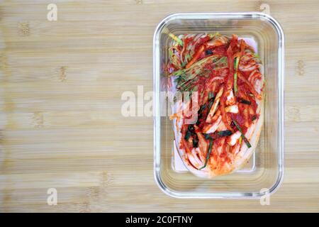 Korean signature Kimchi Stew in a hot ceramic pot served with other side  dishes Stock Photo - Alamy