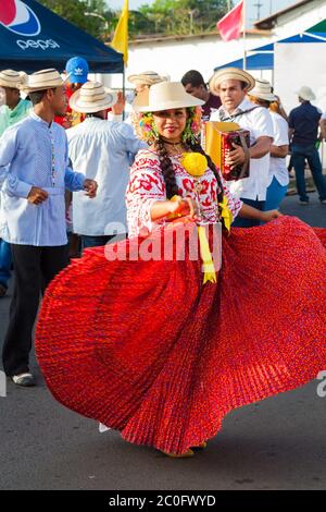 Girl dressed in pollera at the 'El Desfile de las Mil Polleras' (thousand polleras), Las Tablas, Los Santos province, Republic of Panama. Stock Photo