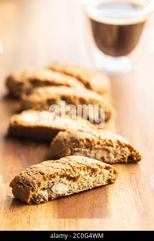 Sweet italian cantuccini cookies. Almonds biscuits on wooden table. Stock Photo