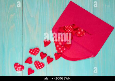 Envelope with  hearts on blue background Stock Photo