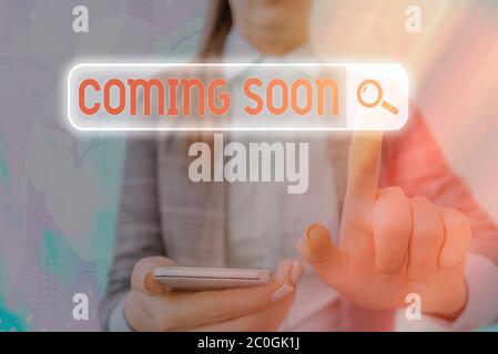 Text sign showing Coming Soon. Business photo text an event that is bound to happen in the future or about to come Stock Photo