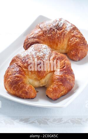 Continental breakfast with coffee , croissants and fresh fruit Stock Photo