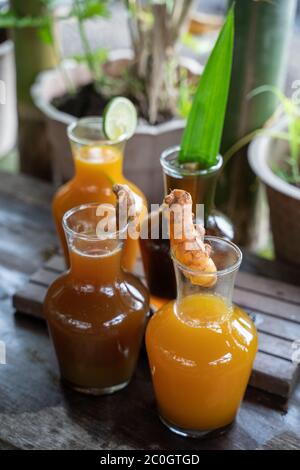 Javaan Bier variety of traditional Javanese herbal drinks are packaged in glass ...