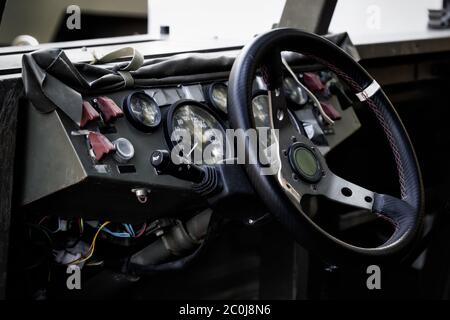 Military vehicle. Army Jeep Interior detail.  Interior Design, Steering Wheel and Dashboard Stock Photo