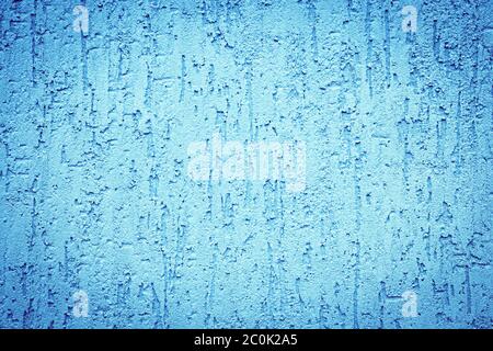 Background of light blue textured stone wall with drips Stock Photo