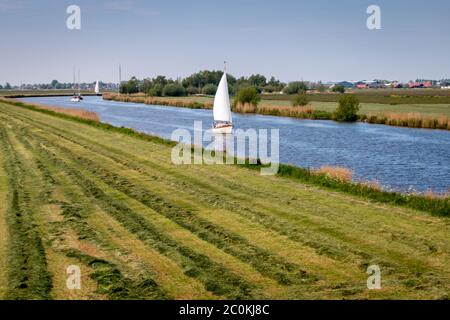 The Netherlands a wet country full of ditches and canals, sailing boats and vast plains with grassland, photos taken in Friesland Gaasterland region Stock Photo