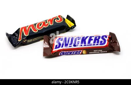 Mars and Snickers chocolate bars on a white background Stock Photo