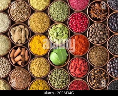 Colored spice background. Spices and herbs top view Stock Photo