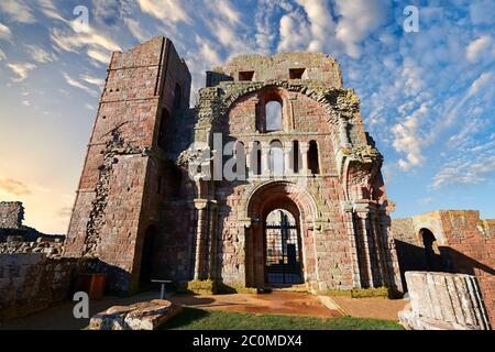 The Anglo Saxon Romanesque Lindisfarne Abbey ruins,  Holy Island, Lindisfarne, Northumbria, England Stock Photo