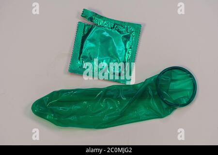 Display of colored condom arranged neatly on a platform Stock Photo