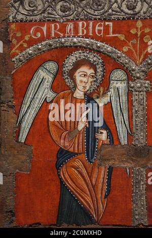 Archangel Gabriel depicted in the Romanesque antependium (altar frontal), known as the Antependium from Mosoll dated from the first third of the 13th century originally from the church of Santa Maria de Mosoll in the town of Das (Baixa Cerdanya) in Girona province in Catalonia, Spain, now on display in the National Art Museum of Catalonia (Museu Nacional d'Art de Catalunya) in Barcelona, Catalonia, Spain. Stock Photo