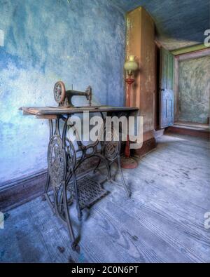 Vintage Sewing Machine in an Abandoned House Stock Photo