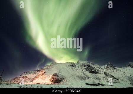 Huge northern lights in Norway. Stock Photo