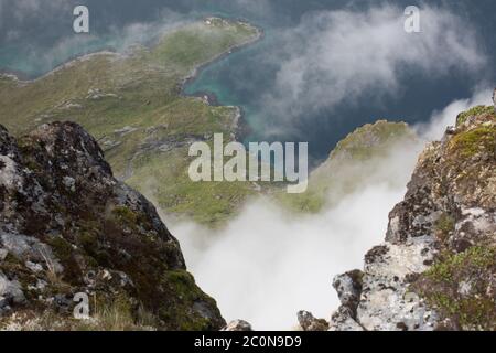 A misty reinefjord in Lofoten. Stock Photo