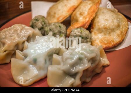 Typical Korean cooked and fried soup dumplings with meat