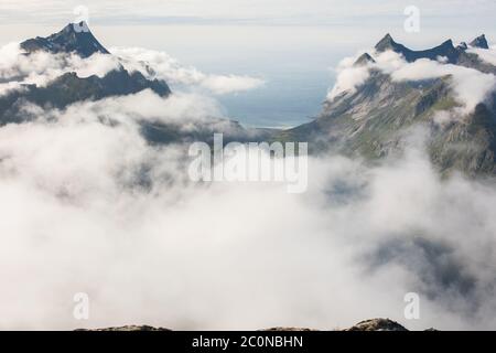 Clouds over Reinefjord in Lofoten. Stock Photo