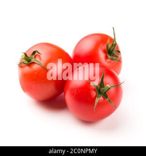 Three tomatoes isolated on white background Stock Photo