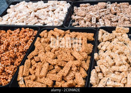 Traditional Korean tea sweets with baked nuts sold in Seoul South Korea Stock Photo