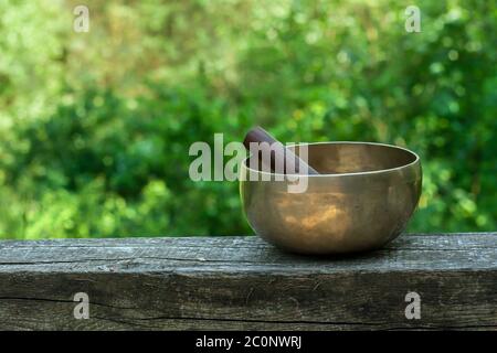 Tibetan singing bowl made of seven metals Stock Photo