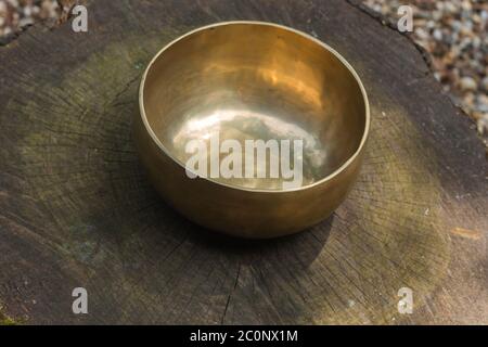 Tibetan singing bowl made of seven metals Stock Photo