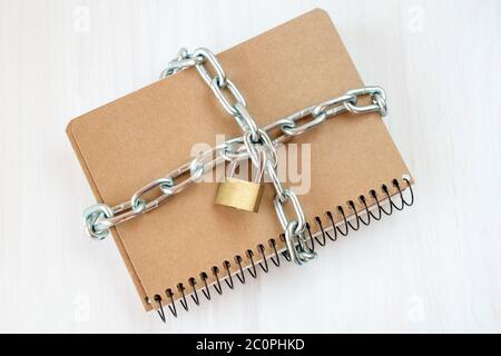 Censorship concept with book and chains Stock Photo