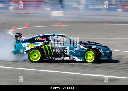 Heraklion, Crete / Greece. Rear wheel special modified racing car while drifting on a race track by a professional driver creating lot of smoke Stock Photo