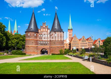 Holsten Gate or Holstein Tor or later Holstentor is a city gate and museum in the Lubeck old town in Germany Stock Photo