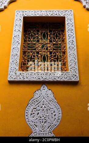 Marrakesh, Morocco. Intricate Arabesque stucco work in the Majorelle Villa, once owned by Yves Saint Laurant - now a very popular tourist attraction. Stock Photo