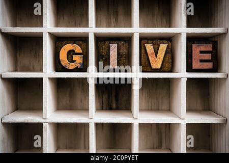 Give Concept Wooden Letterpress Type in Draw Stock Photo