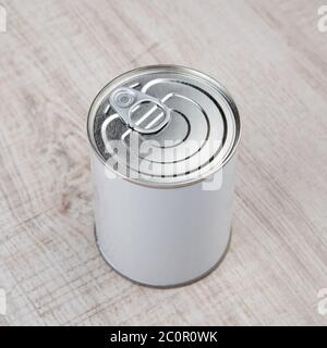 tin can on white wood background Stock Photo