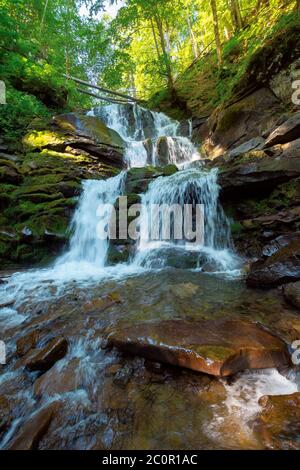 great water fall in the forest. beautiful nature landscape. river among the rocks. fresh summer scenery. Shypot is a popular tourist attraction of pyl Stock Photo