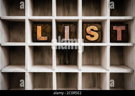 List Concept Wooden Letterpress Type in Drawer Stock Photo