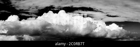 View of Puffy White Clouds with Blue Sky Stock Photo