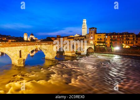 Ponte Pietra bridge is a Roman arch stone bridge crossing the Adige River in Verona, Veneto region in Italy Stock Photo