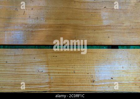 Light brown wooden lacquered planks horizontal background. wooden pine planks for parquet walls or floors. Stock Photo