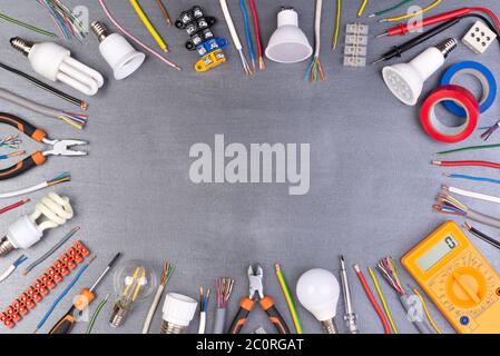 Electrician equipment on grey background, top view Stock Photo