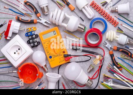 Electrician equipment on grey background, top view Stock Photo