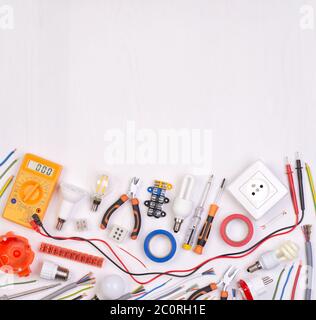 Electrician equipment on white background, top view Stock Photo