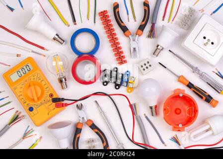 Electrician equipment on white background, top view Stock Photo