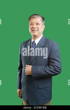 Portrait gesture of old asian man in suit and tie with smiling Stock Photo