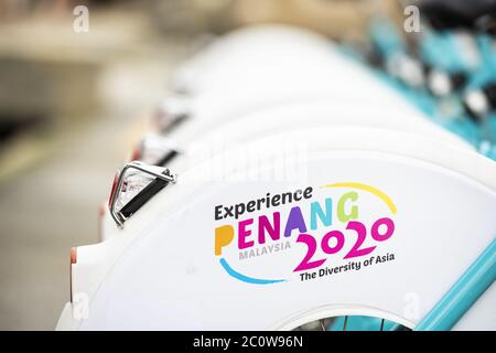 (Selective focus) Experience Penang 2020 campaign posted on the 'LinkBike' bikes, a bike sharing system located in George Town, Penang, Malaysia. Stock Photo