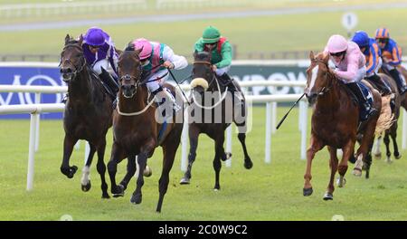 Siskin ridden by Colin Keane (second left) wins the Tattersalls Irish 2000 Guineas at Curragh Racecourse. Stock Photo