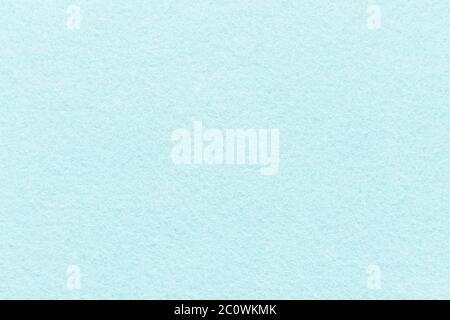 High resolution close up of light blue felt fabric texture of rough fleecy fabric of blue color for backgrounds and for wallpaper an light blue piece Stock Photo