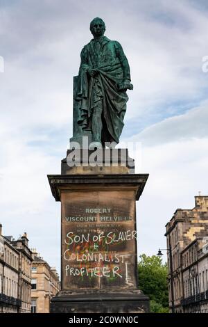 Edinburgh, Scotland, UK. 12 June 2020. Black lives matter protestors have sprayed graffiti on statue of Robert Viscount Melville, son of slave owner Henry Dundas, in Edinburgh. This is one of many colonial era statues of former slavers that are under threat by protestors who want them taken down.  Iain Masterton/Alamy Live News Stock Photo