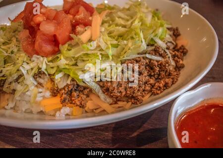 Japanese taco rice with spicy sauce in Naha Okinawa Japan Stock Photo