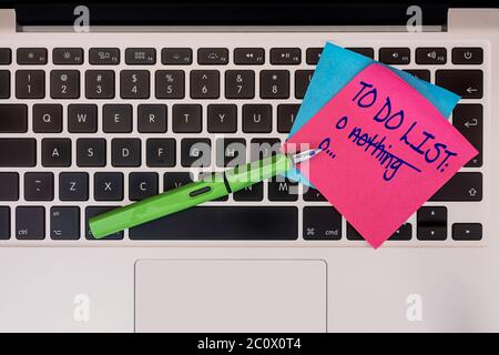 Post-it note with the words To Do List "nothing" on a computer laptop Stock Photo