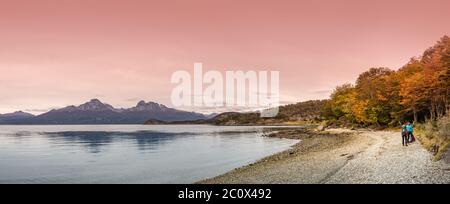 Two hikers in the trail in wonderful Tierra del Fuego National Park, Patagonia Stock Photo