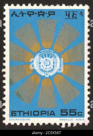 The scanned stamp. Stamp of Ethiopia. Pattern on a blue background. Stock Photo